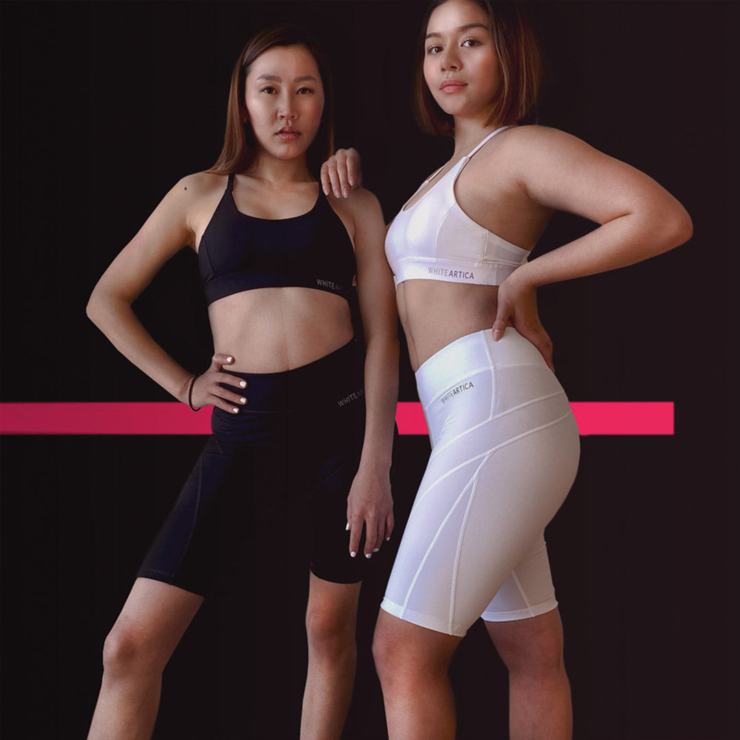 Fitness girls wearing black and white modern gym outfit