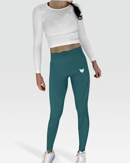 Australian woman wearing white artica high-waisted exercise pants and forrest sage leggings activewear to performance at her best during fitness workout using the best sports cloths and active wear