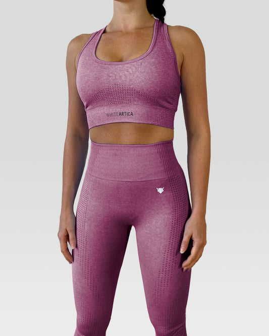Australian woman wearing white artica high-waisted exercise pants and leggings activewear for her purple activewear workout fitness cloths